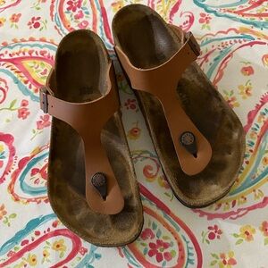 Tan birkoflor Birkenstock thing sandal. 38 regular. Worn a few times.